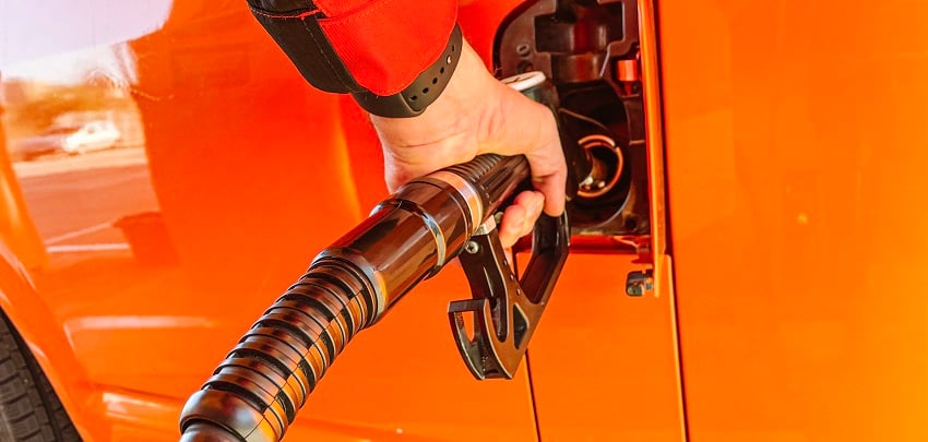 man-s-hand-filling-the-tank-of-his-vehicle-with-th-2022-01-17-15-56-17-utc